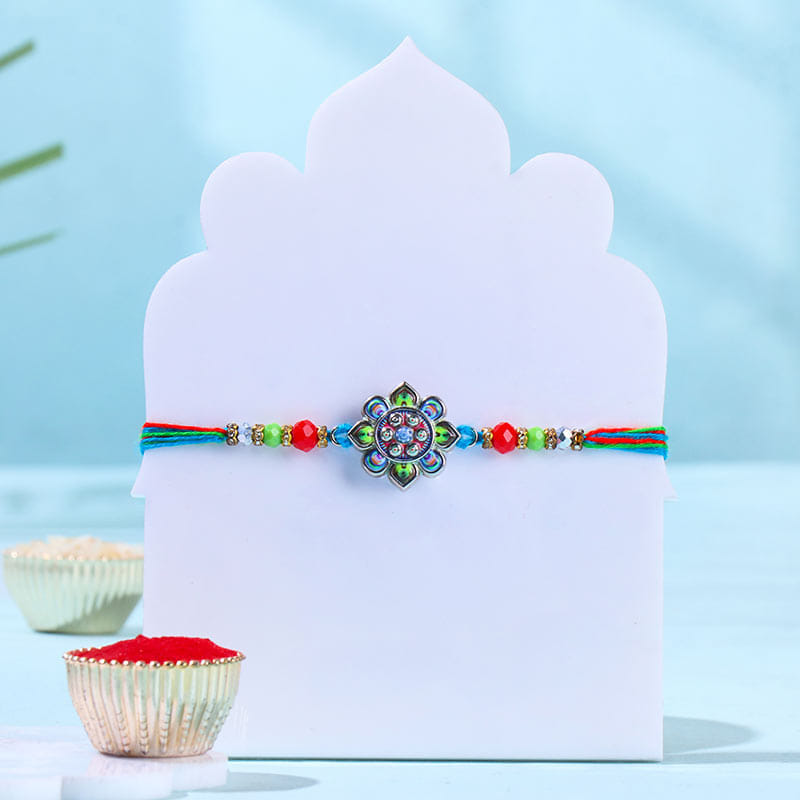 Multicolour Floral Rakhi N Baklawa Fusion Sweets