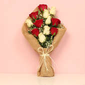 Bunch of Red and White Roses in Jute Packing