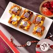 Nutberry Sweet With Holy Om Rakhi Bracelet