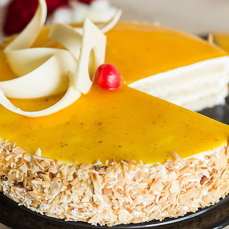 Zoom view of Nutty Mango Birthday Cake
