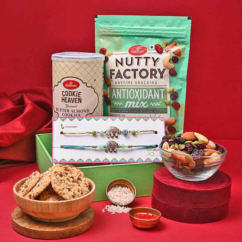 Buy Set of 2 Rakhi Online For Brother with Dry Fruits - Butter Cookies N Assorted Nuts With Ganesha Rakhis