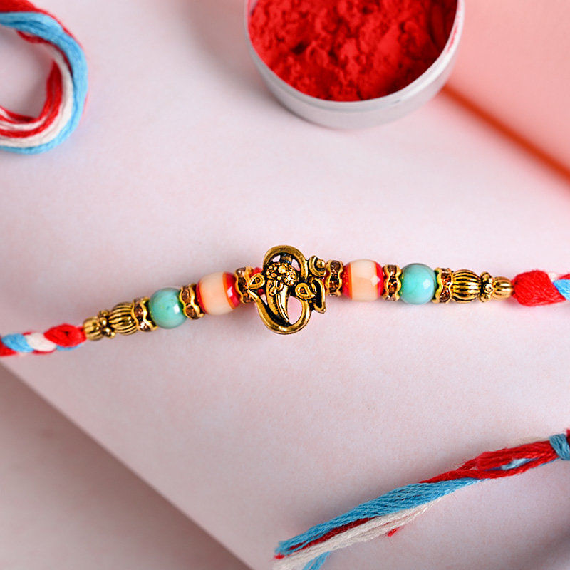 Om Kirpan Beads Rakhi