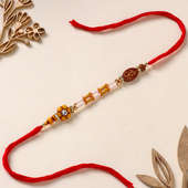 Om N Flower Pearl Rakhi