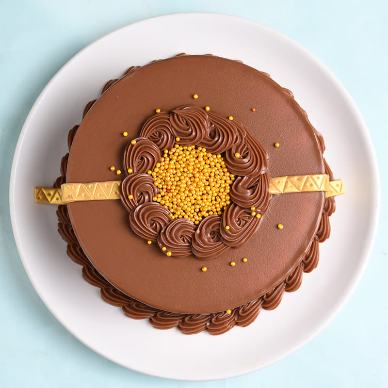 Om N Ganesha Rakhi Duo With Choco Truffle Cake