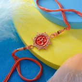 Om Peach Studded Rakhi