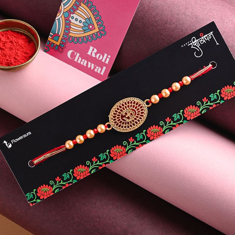 Buy Om Stone Engraved Pearl Rakhi - Online Divine rakhi For Brother