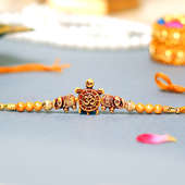 Om Turtle Beads Rakhi - A Fancy Rakhi - Order Online Now