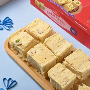 Multicoloured Charm Rakhi With Soan Papdi