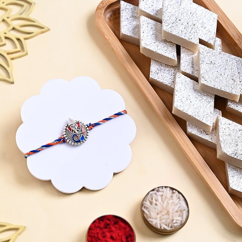One Sacred Ganesha Rakhi With Kaju Katli