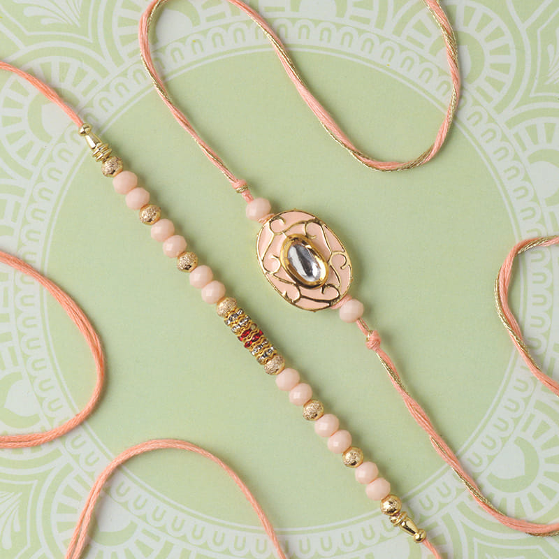 Send Designer Opulent Gem Light Pink Rakhi Set Online - Pearl Rakhi