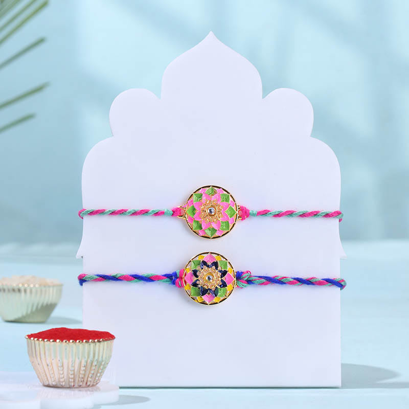 Orange Blue Floral Rakhi Duo With Festive Sweet
