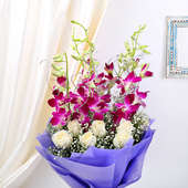 Bunch of 6 Orchid and 12 white roses on Table in Horizontal View