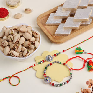 Ornate Bhaiya Bhabhi Rakhis With Festive Treats