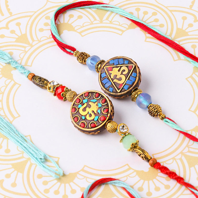 Ornate Holy Rakhi Duo: Set of 2 Rakhi online