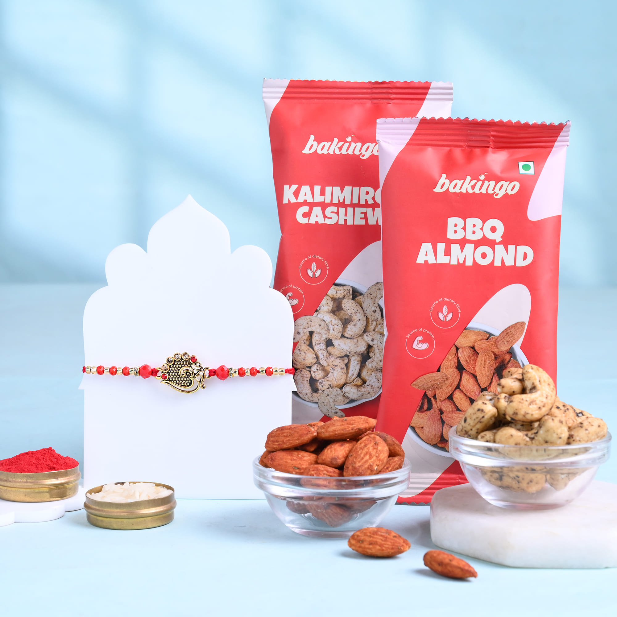 Ornate Om Rakhi With Gourmet Dryfruits