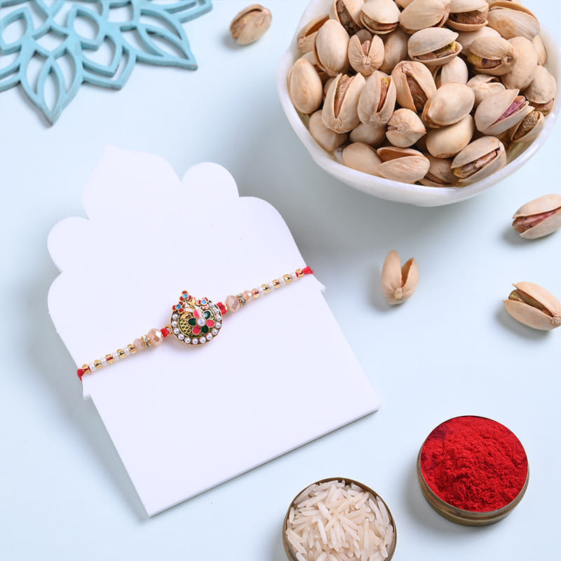 Ornate Pearl Rakhi N Pistachios Combo