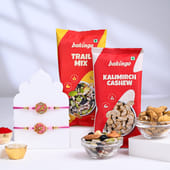 Ornate Pink Rakhi Duo With Savoury Treats