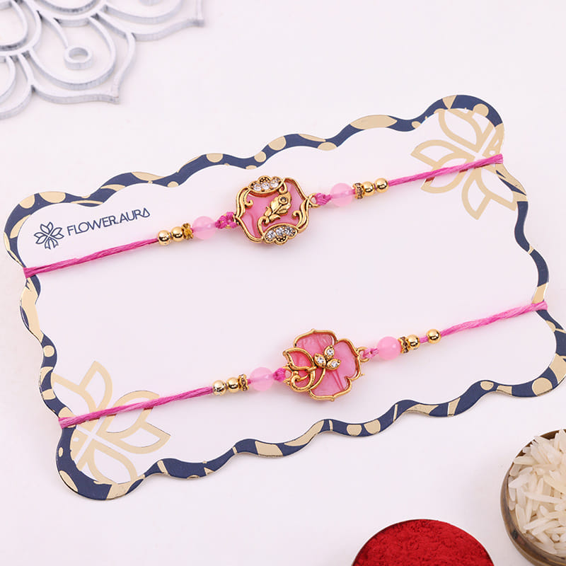Ornate Pink Rakhi Duo With Savoury Treats