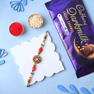 Send Ornate Stone Rakhi With Dark Milk Caramel Bar to UK 