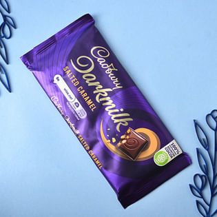 Send Ornate Stone Rakhi With Dark Milk Caramel Bar to UK 