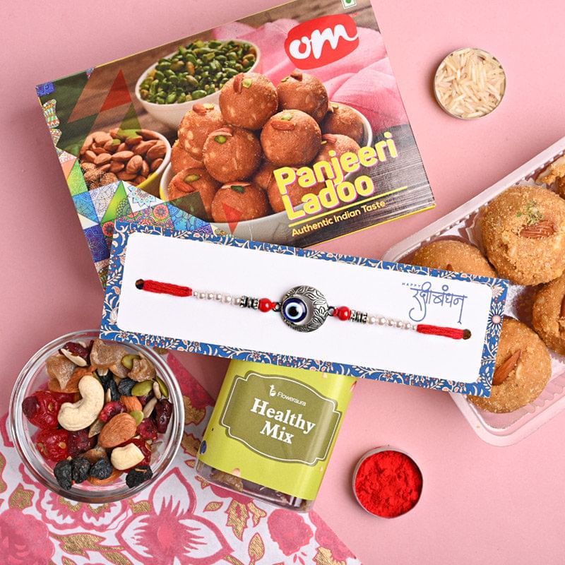 Buy Rakhi Sets online for Brother - Panjeeri Ladoo With Healthy Mix N Good Luck Rakhi