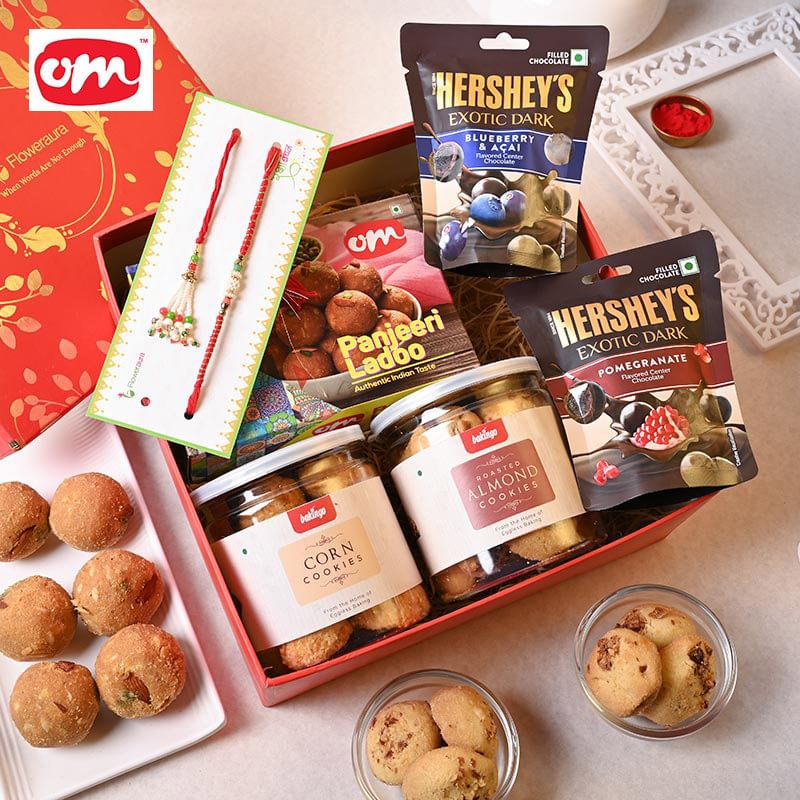Send Panjiri Laddoo Cookies N Choco With Couple Rakhi for Bhaiya bhabhi Online