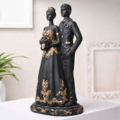 Side View of Party Ready Couple Figurine