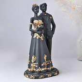 Side View of Party Ready Couple Figurine