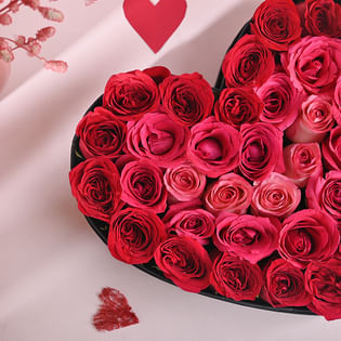 Passion and Grace 35 Roses: Bunch of 20 red roses and 15 pink roses in a heart-shaped box