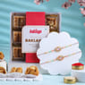 Pastel Charm Rakhi Duo With Sweets