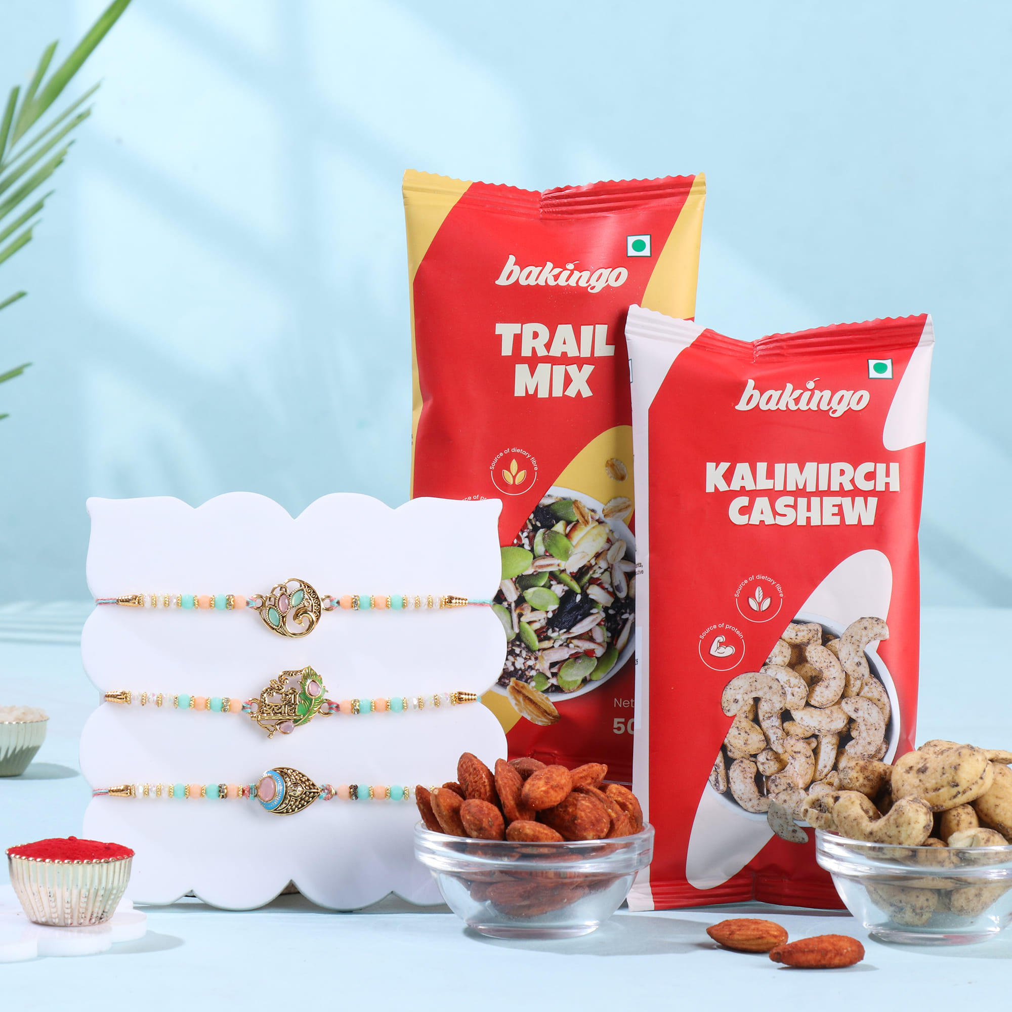 Pastel Divine Rakhi Trio With Savoury Treats