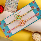 Pastel Floral Rakhi Duo in Package