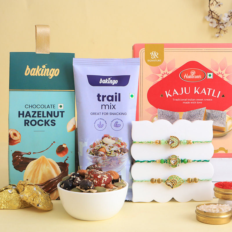 Pastel Green Rakhi Trio With Sweet N Healthy Bites