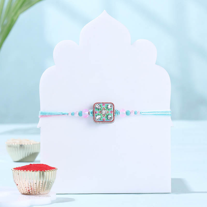 Pastel Hued Square Rakhi With Kaju Katli