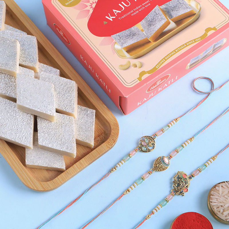 Pastel Rakhi Set Of Three With Kaju Katli