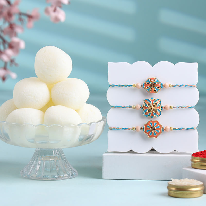 Pastel Trio Rakhi Set With Rasgulla Treat