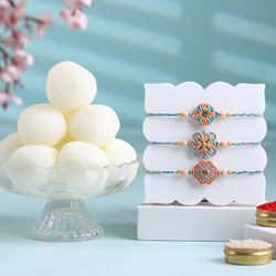 Pastel Trio Rakhi Set With Rasgulla Treat