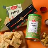 Buy Divine rakhi Online For Brotherwith Sweets & Dry Fruits - Punjabi Patisa with Baked Cashews N Blessed Khanda Rakhi