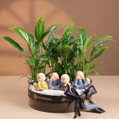 Peace Lily Plant In Thali Vase With Monks