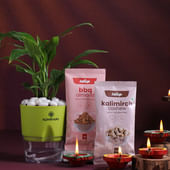 Peace Lily With Nuts N Diyas