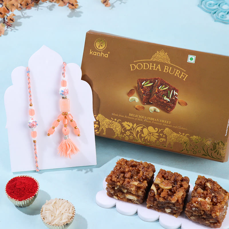 Peach Beads Bhai Bhabhi Rakhi With Dodha Burfi