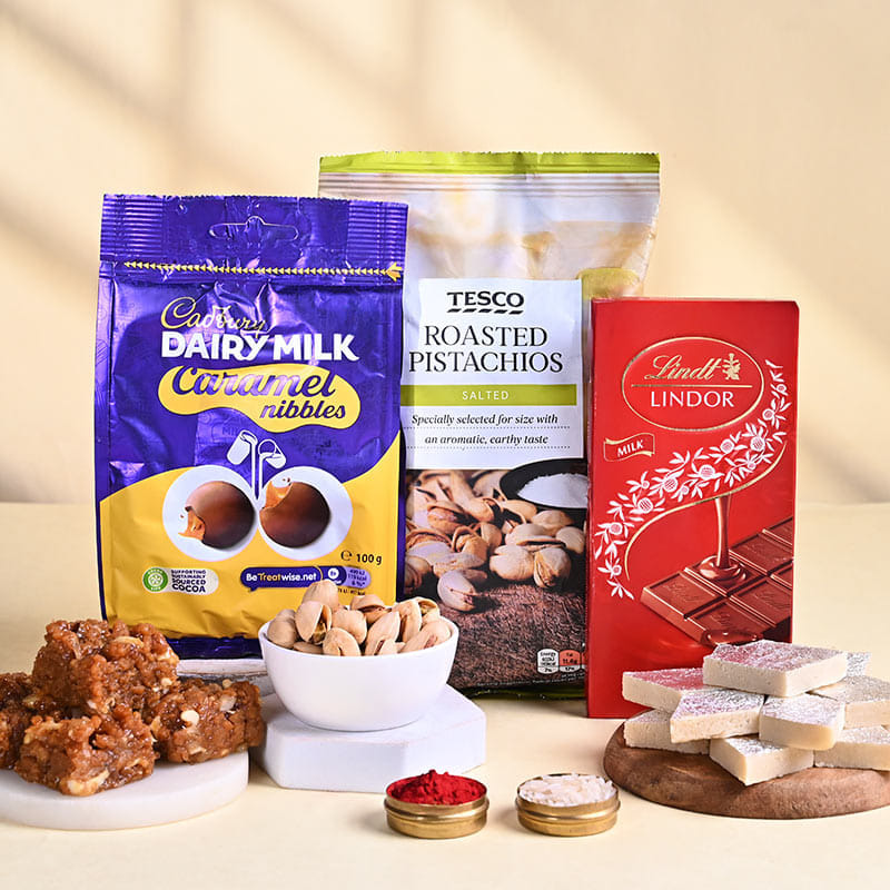 Peach Bloom Bhaiya Bhabhi Rakhis N Treats Hamper
