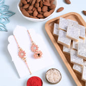 Peach Floral Bhai Bhabhi Rakhi With Sweets N Nuts