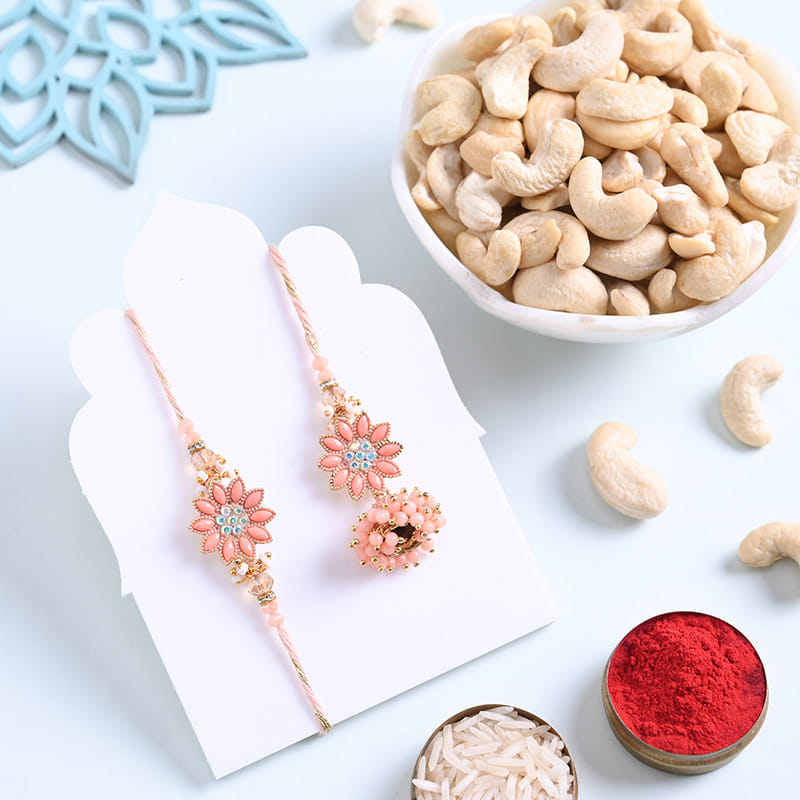 Peach Floral Bhaiya Bhabhi Rakhis With Cashews
