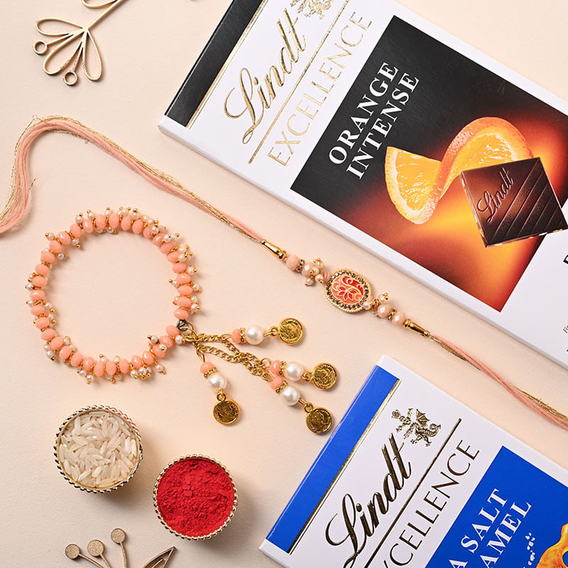 Peach Pearl Bhaiya Bhabhi Rakhi With Lindt Chocolates