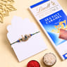 Peacock Charm Rakhi With Caramel Chocolate