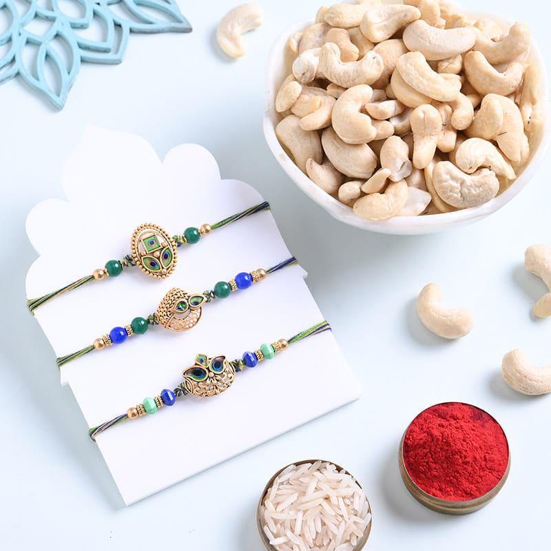 Peacock Feather Rakhi Trio With Cashews