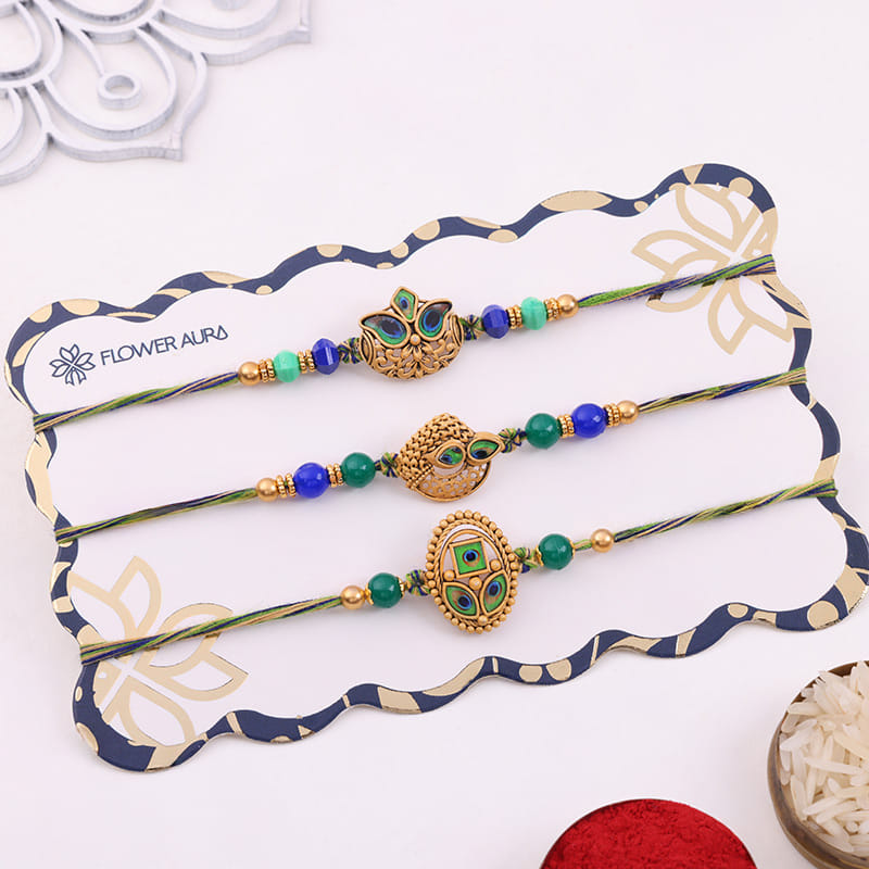 Peacock Inspo Rakhi Trio With Gourmet Snacks