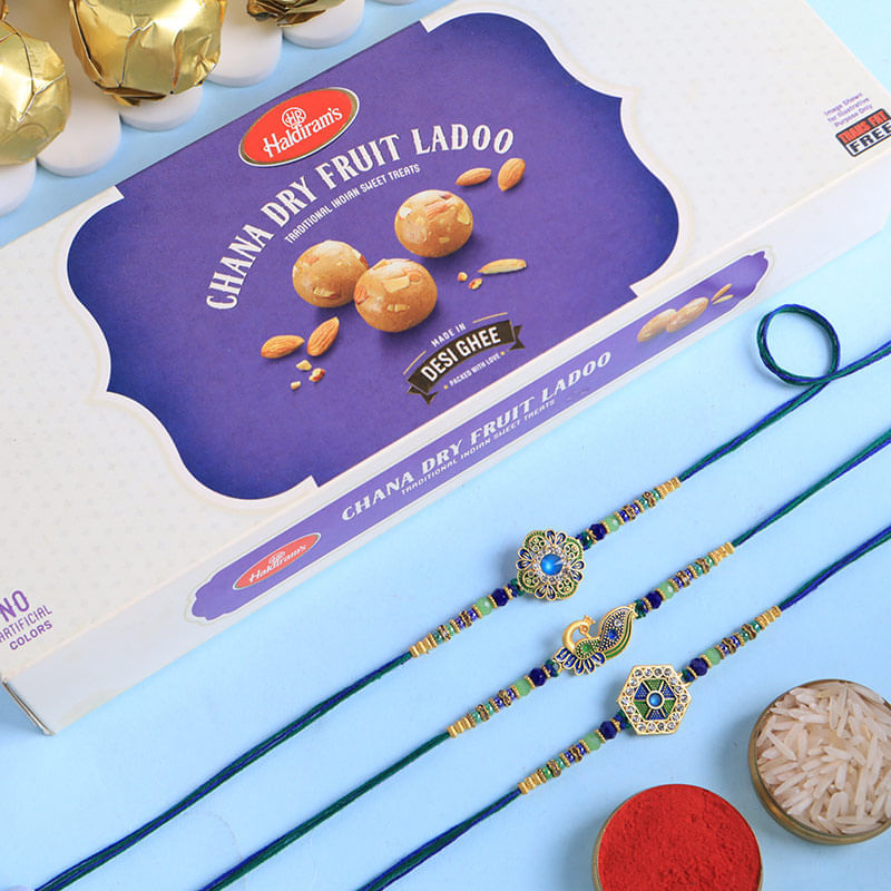 Peacock Motif Rakhi Trio With Chana Ladoos