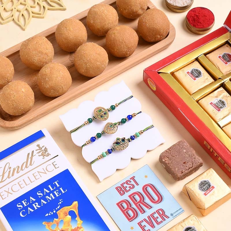 Peacock Motifs Rakhi Trio With Sweets N Chocolate